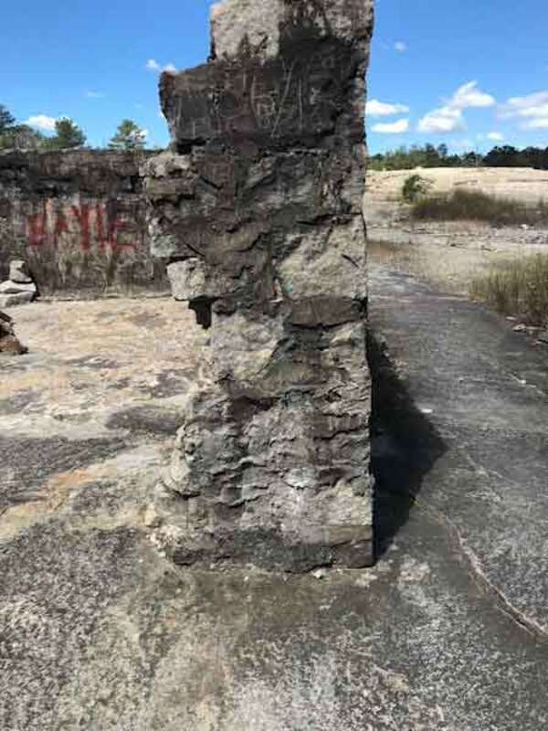 Old stone wall of abandoned building at Arabia Mountain Park.