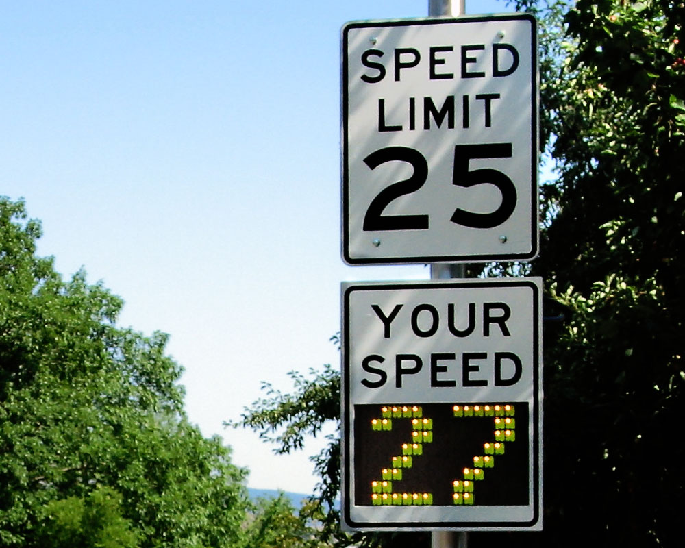 Close-up of a radar-based speed feedback sign, with the recorded speed over the limit. Northbound sign on 9th Street, Boulder, Colorado, United States. Near the junction with Cascade Avenue.