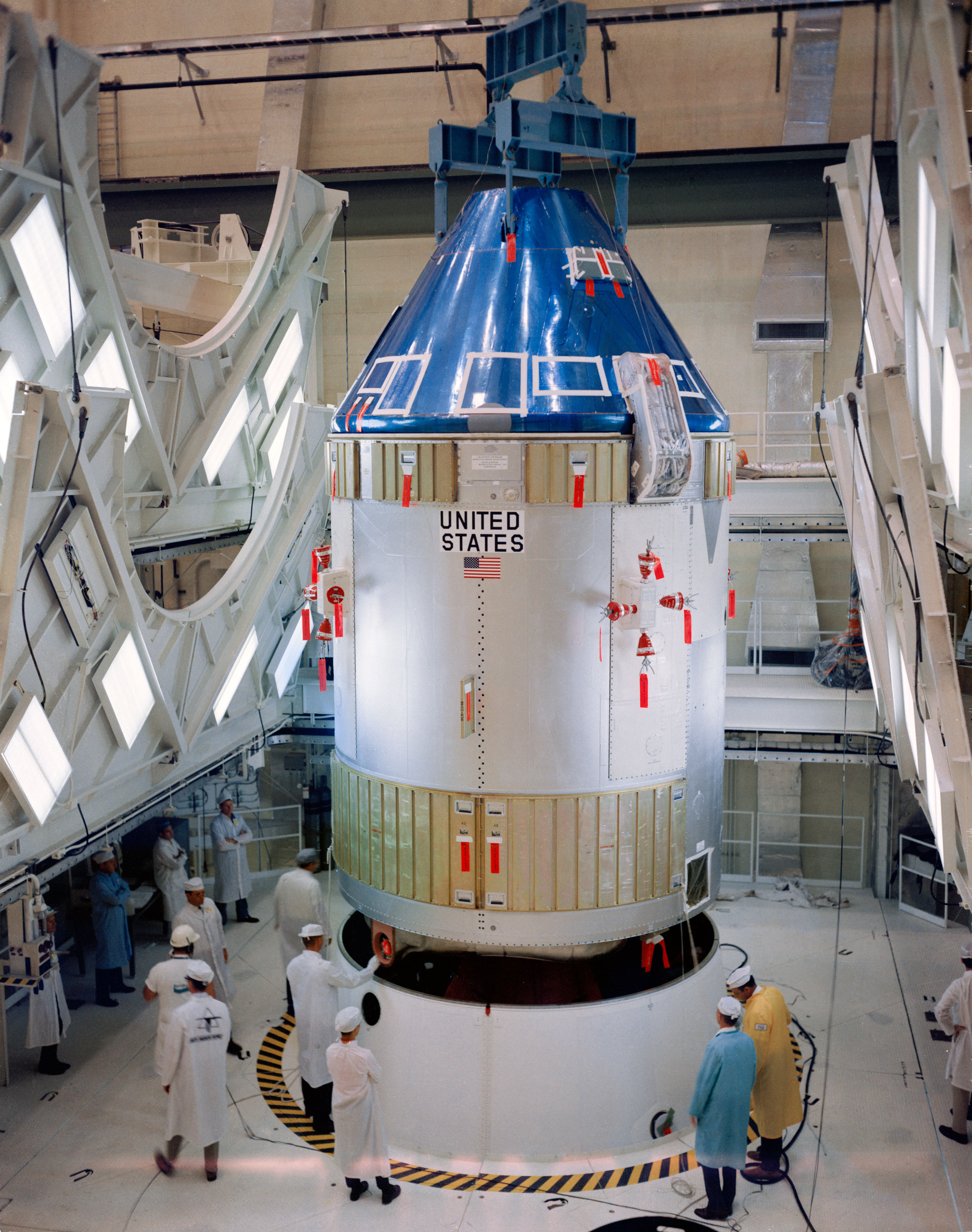 S68-42513 (5 Aug. 1968) --- Apollo Spacecraft 101 Command/Service Modules being moved into position for mating with Spacecraft Lunar Module Adapter (SLA)-5 in the Kennedy Space Center's Manned Spacecraft Operations Building. Apollo Spacecraft 101