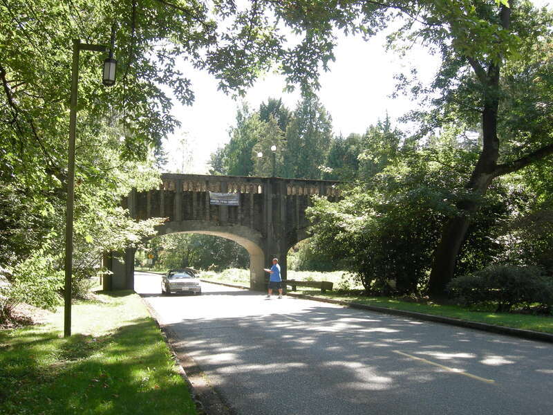 Footbridge in Washington Park Arboretum, Seattle, Washington, bridging Lake Washington Blvd., listed in the National Register of Historic Places. Looking roughly south.