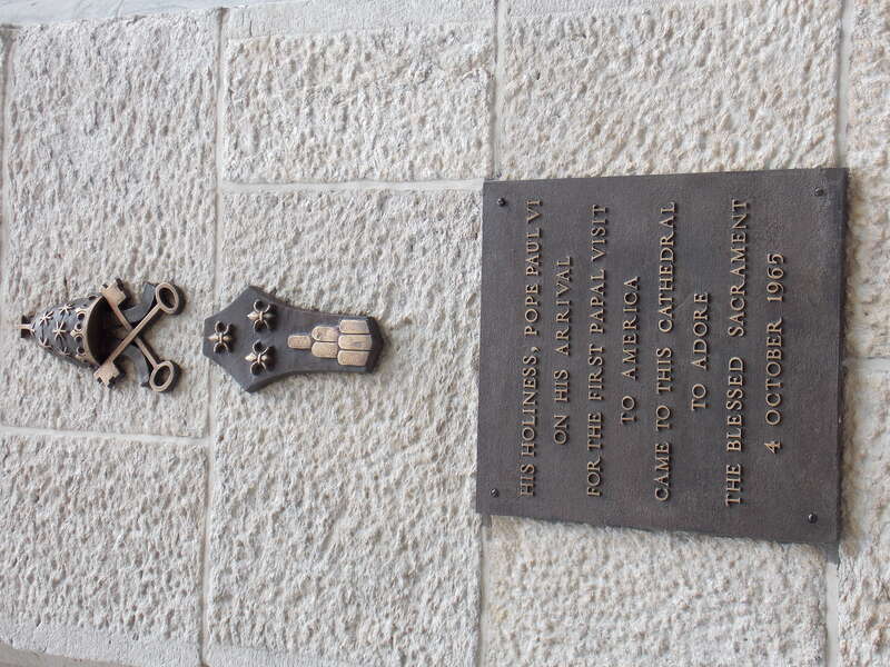 The plaque commemorating the visit of Pope Paul VI in 1965 to St. Patrick's Cathedral in Manhattan, New York.