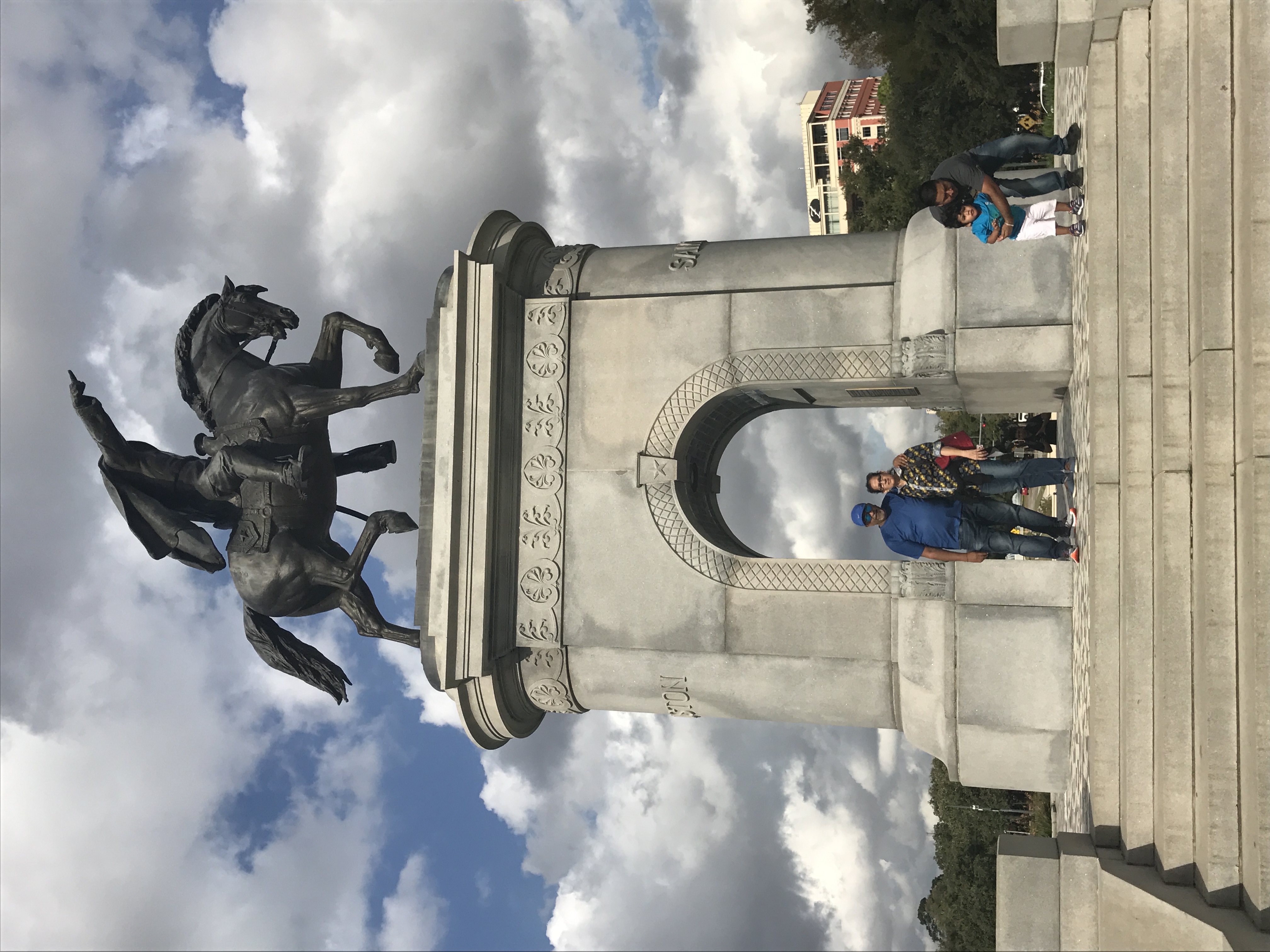 Sam houston on top of his original horse in a military attire, riding for protecting houston; pointing his finger in the way for his army to attack