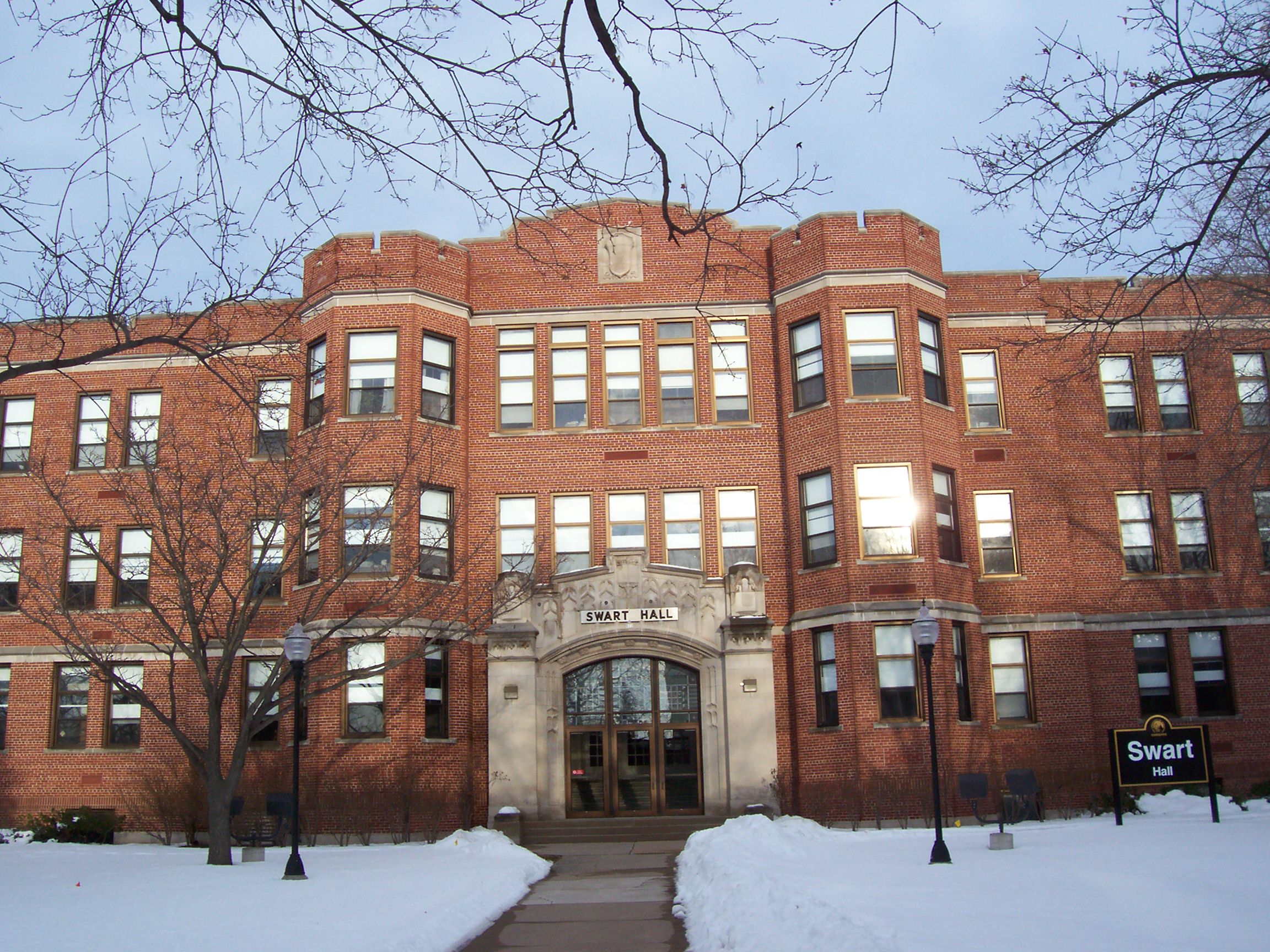 Dempsey Hall the administration building at the w:University of Wisconsin-Oshkosh. It is a national registered place as part of the Oshkosh State Normal School Historic District.