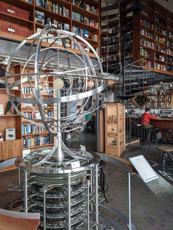 The Interval bar of The Long Now Foundation, San Francisco. In the foreground is an orrery.