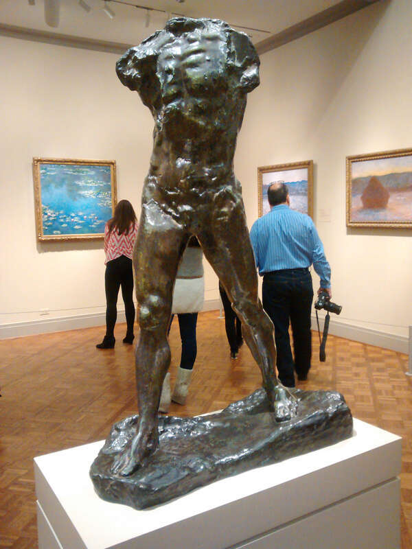 Front view of The Walking Man at the Art Institute of Chicago.