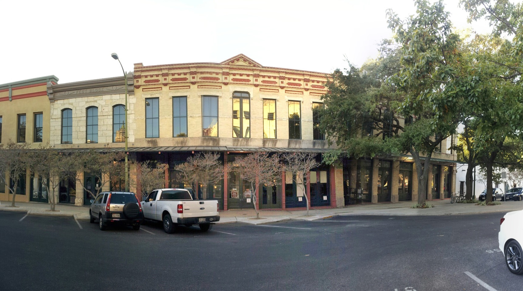 Vogel Belt Complex, San Antonio, Texas.  White building on far right side is the Spanish Governor's Palace.  Listed on the National Register of Historic Places.