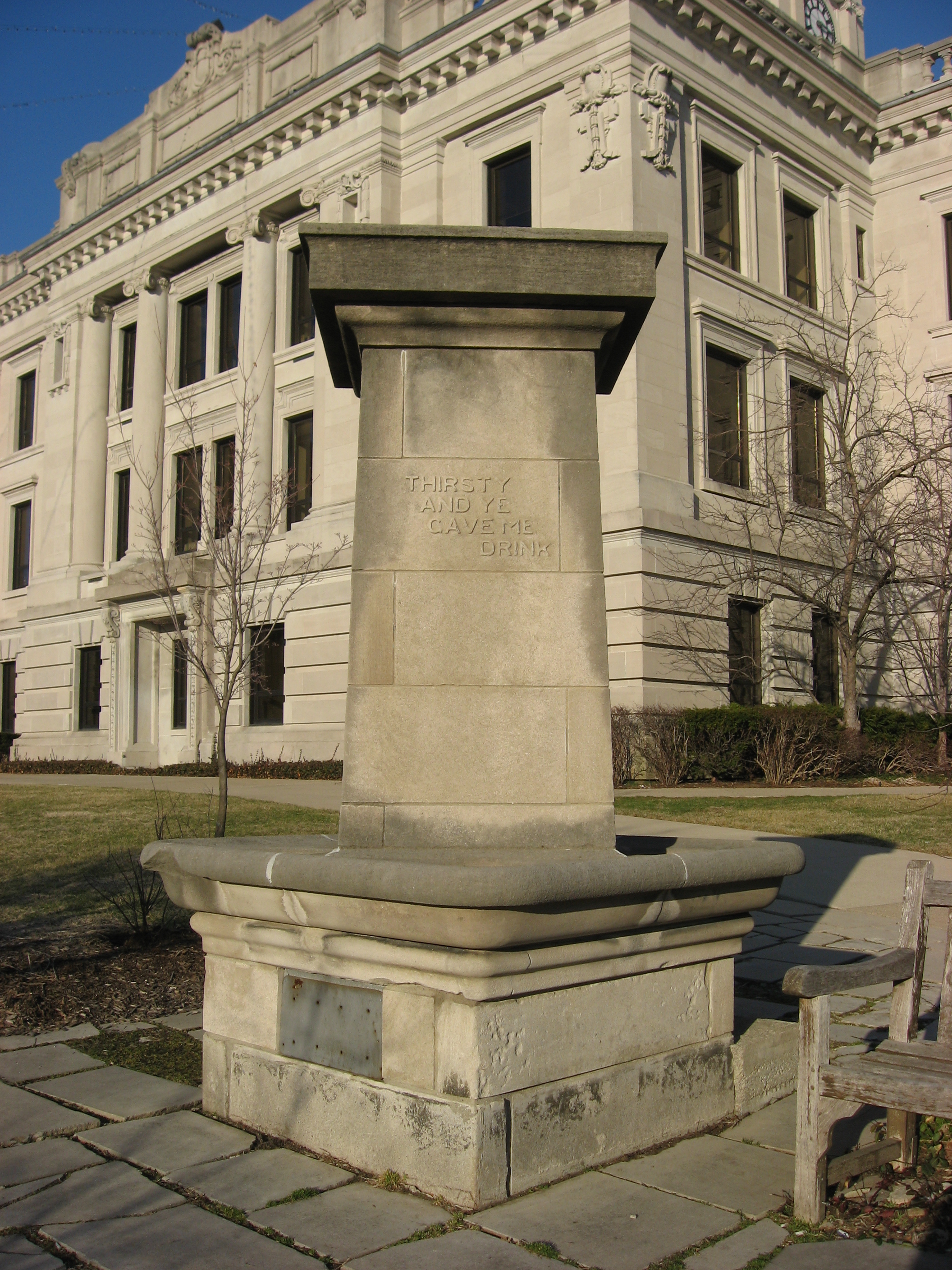 A stone drinking fountain on the southwestern portion of the grounds of the Monroe County Courthouse, located on Courthouse Square in downtown Bloomington, Indiana, United States.  Placed in 1913 by the Monroe County chapter of the Woman's Christian