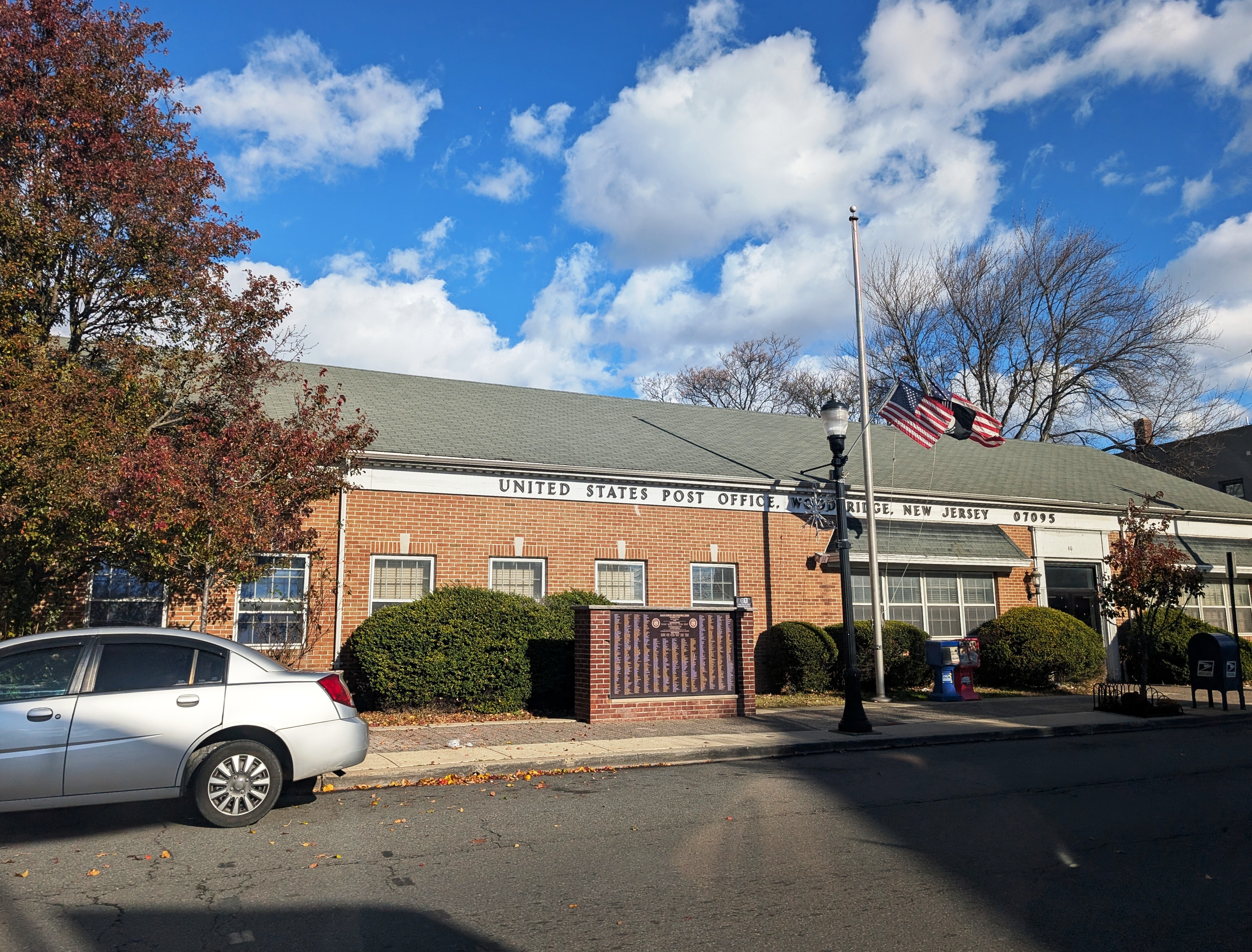 Photo of the Woodbridge United States Post Office in the downtown area of Woodbridge within Woodbridge Township, New Jersey. Photo taken from County Route 514 (Main Street) looking northeast.