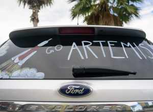 A car in a hotel parking lot is decorated in support of the NASA Artemis I mission, Friday, Sept. 2, 2022, in Titusville, Florida. NASA’s Artemis I flight test is the first integrated test of the agency’s deep space exploration systems: the Orion
