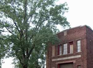 Discovered at the end of a dirt road - see the map.

"[R]easons given for deciding to locate in the Central Manufacturing District included... the low insurance rates (stemming from excellent fire protection)"