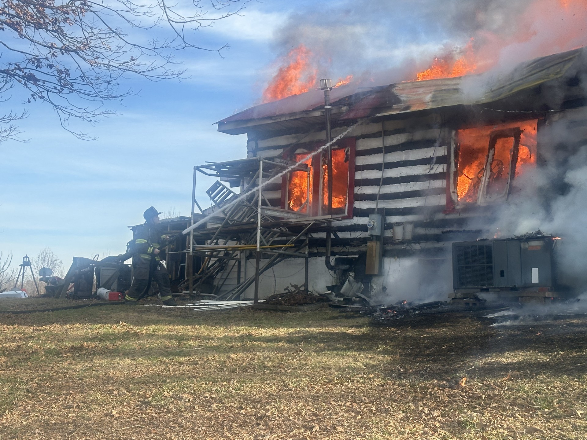 Flames rip through log house in Kanawha County - WV MetroNews