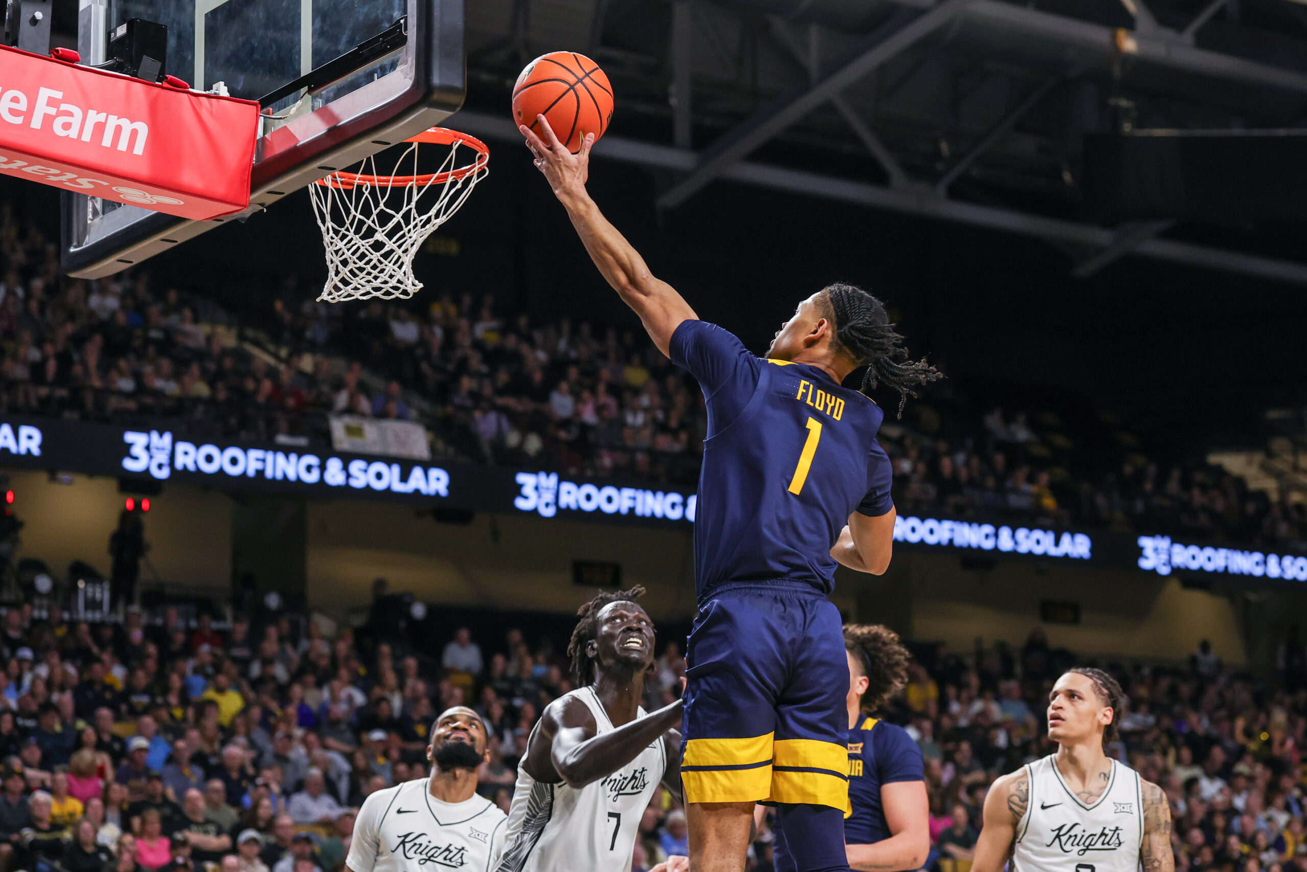 Second-half rally sends West Virginia to 74-67 victory at UCF