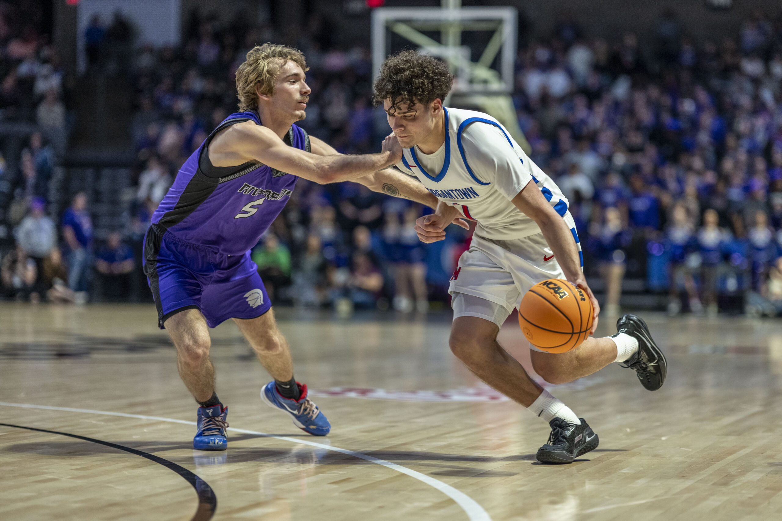 Morgantown shoots 61 percent, dominates boards to advance past Riverside, 73-58