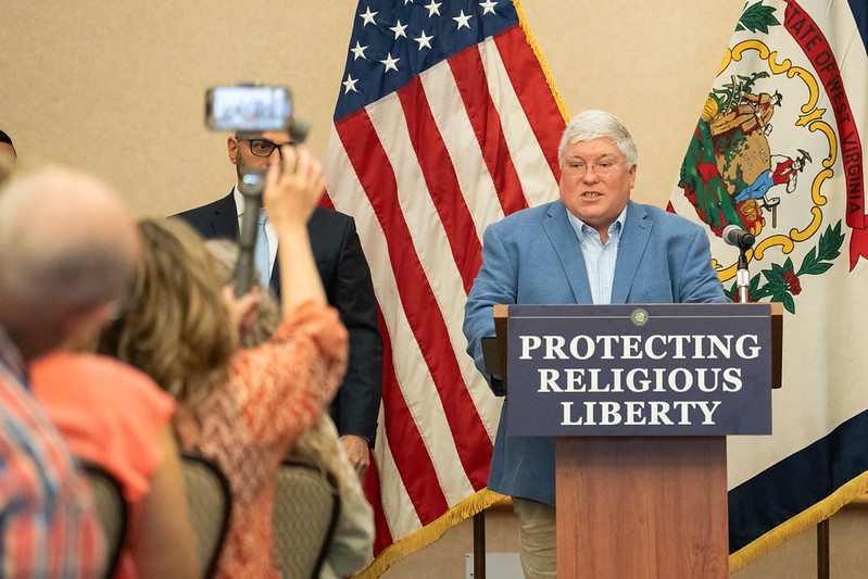 In Supreme Court review, governor defends religious exemptions to mandatory school vaccinations