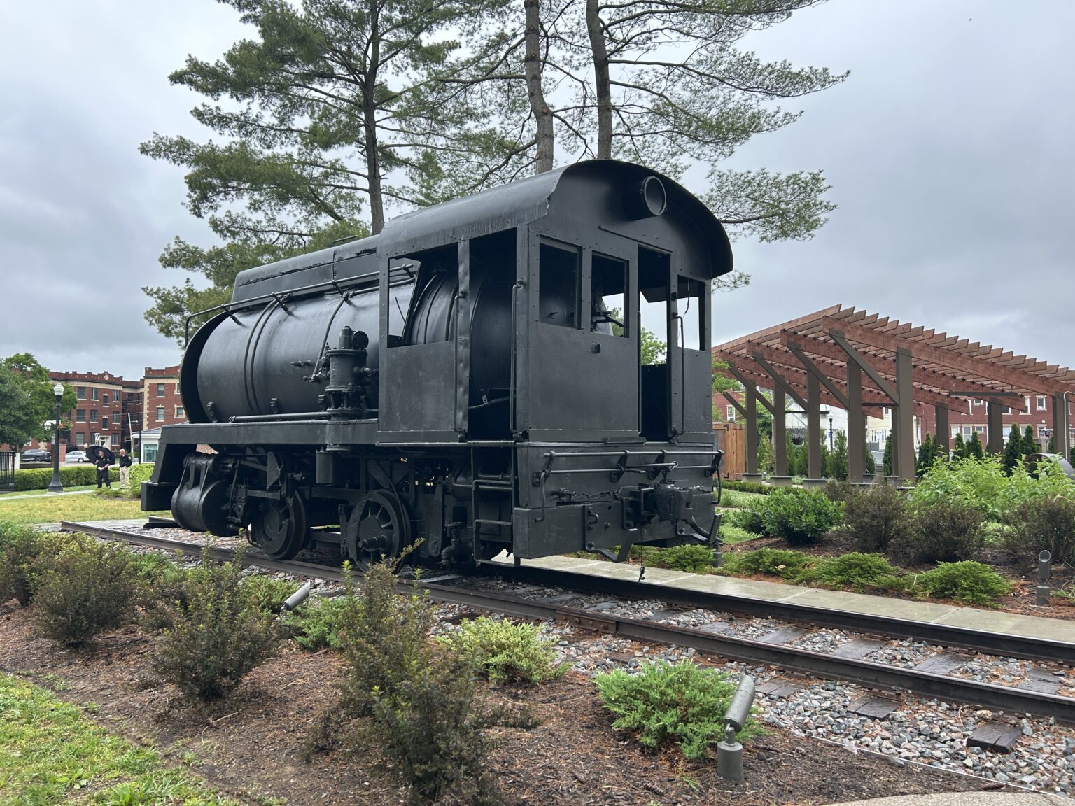 50-ton steam engine, 20-ton coal shuttle car placed beside state ...