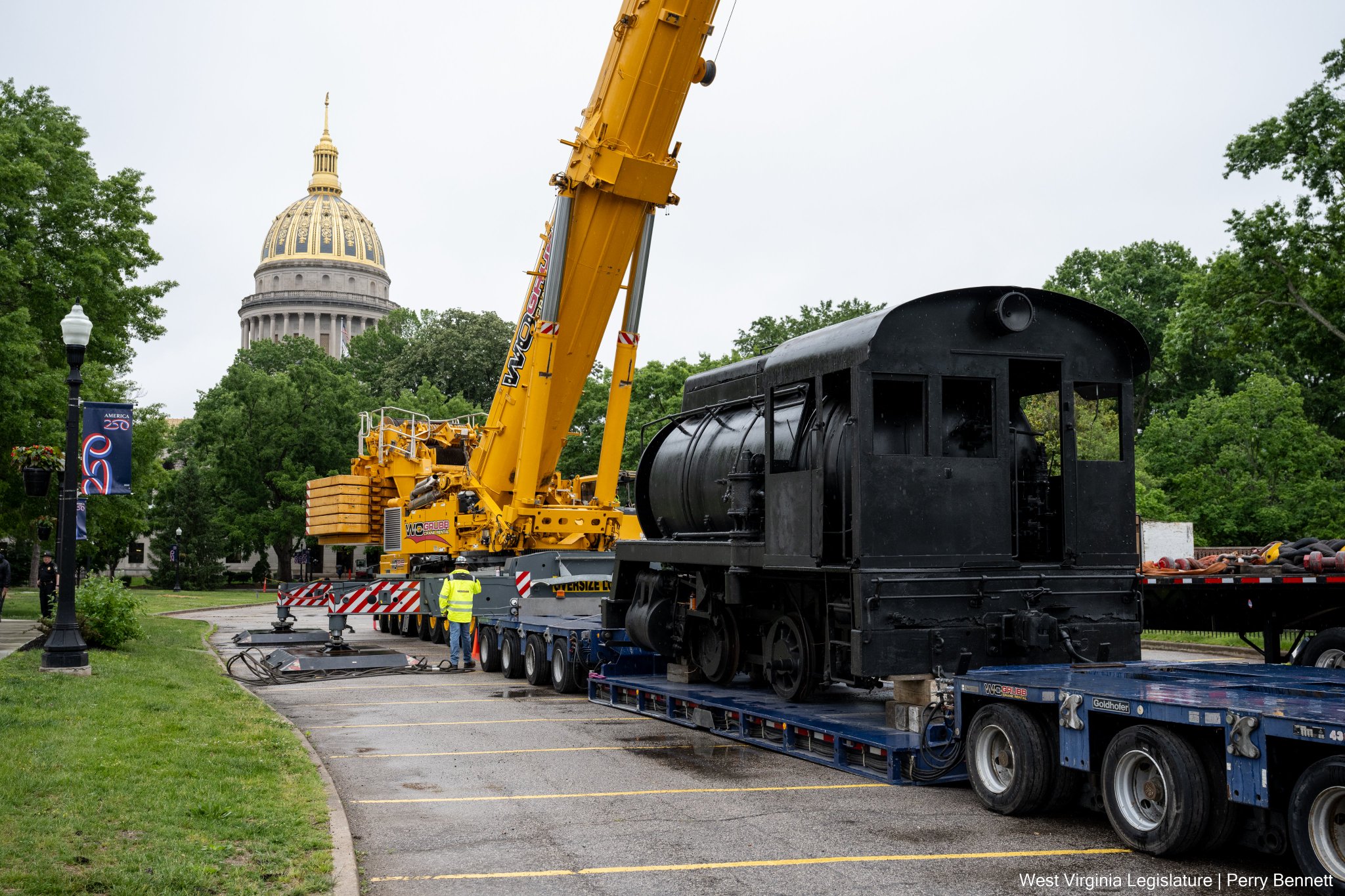 50-ton steam engine, 20-ton coal shuttle car placed beside state ...