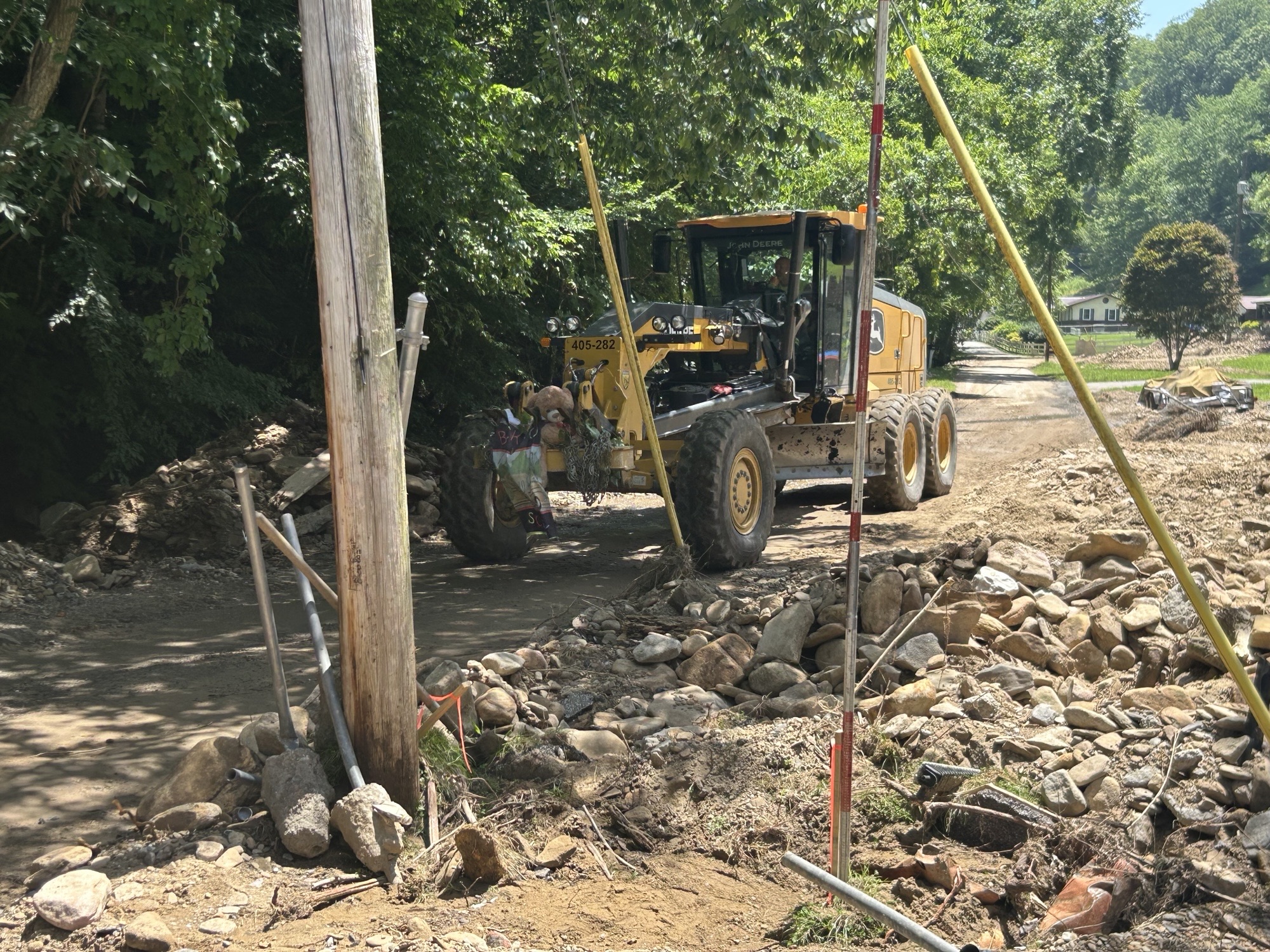 Crews rebuild flood damaged road in Boone County
