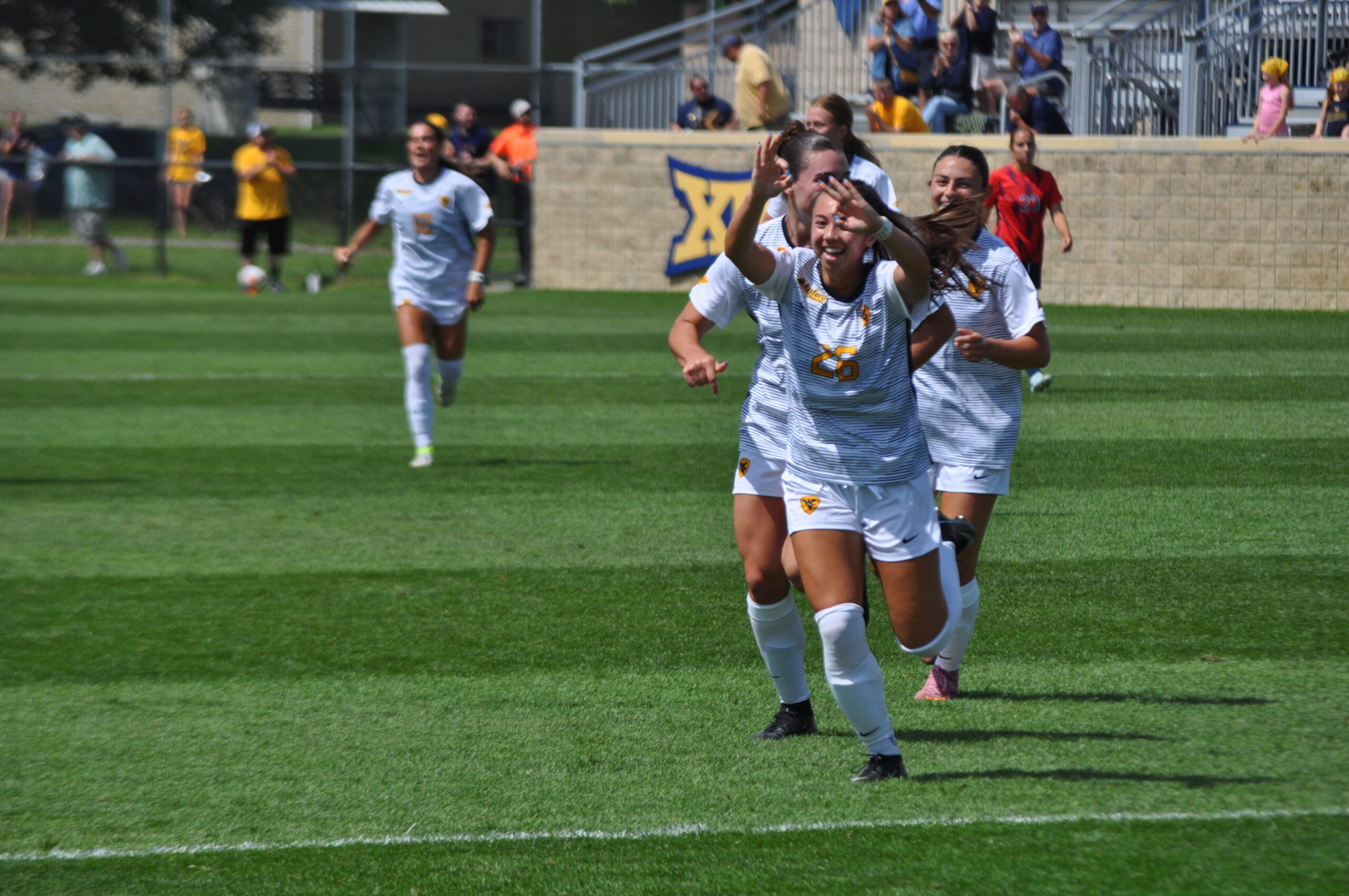 Mountaineers score late to down Duquesne, 2-0