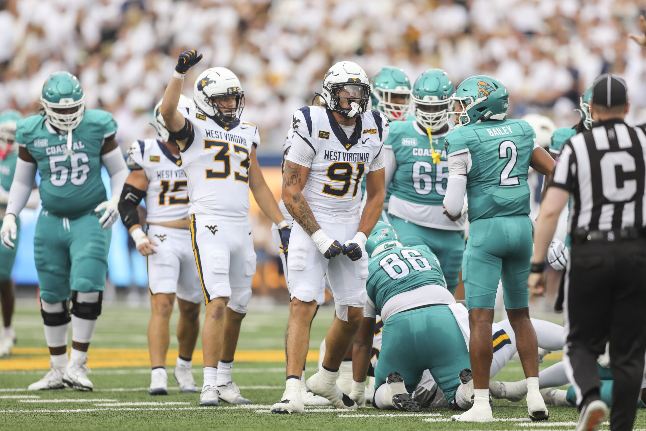 Follow along: WVU starts strong, struggles in second half of 31-24 win against Coastal Carolina